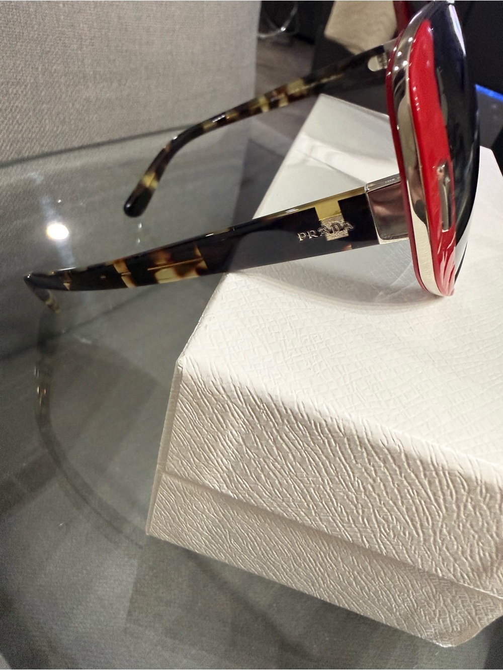Prada Silver Frame Sunglasses with Red Side Accents - Picture 2 of 8